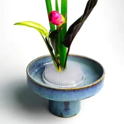 4 blomformade blomsterarrangemang i klar plast, 70 mm