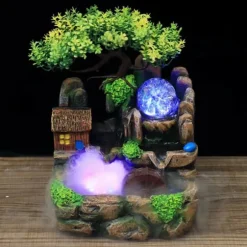 Bordsfontän - Inomhusfontän - LED-belysning - Konstgjorda träd - Klipplandskap - Cirkulerande vatten - 27 x 20 x 16 cm - Harts