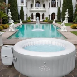 Uppblåsbar jacuzzi – 4 personer – 100 massagestrålar – 600L – Kvadratisk – Med filterpump och lock – Ø154 cm – Upp till 40°C – Inomhus och utomhus