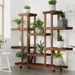 vidaXL Växtställ med hjul 110x25x115 cm massiv furu - Växtställ